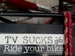 Read I Heart My TV Sucks Ride Your Bike Bumper Sticker